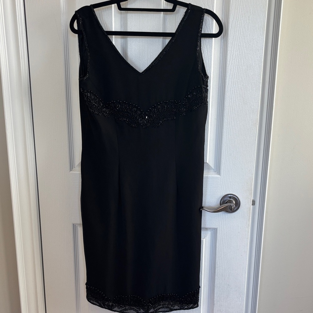 Elegant Black Sleeveless Dress with Beaded Details
